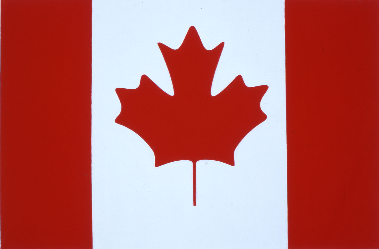 A bold graphic design featuring a red maple leaf centered on a white field flanked by vertical red stripes.