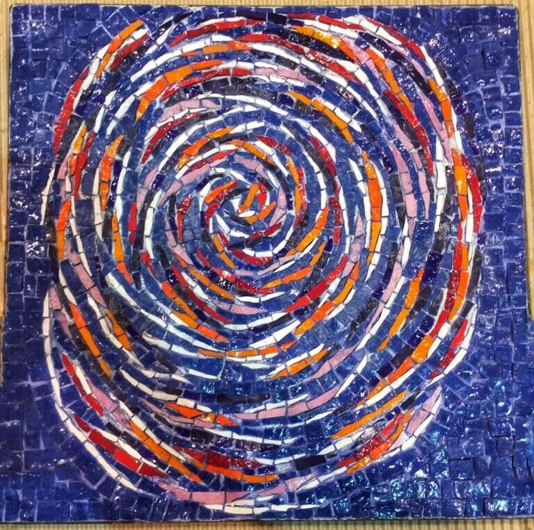 A mesmerizing spiral mosaic artwork featuring vibrant colors and a hypnotic design.