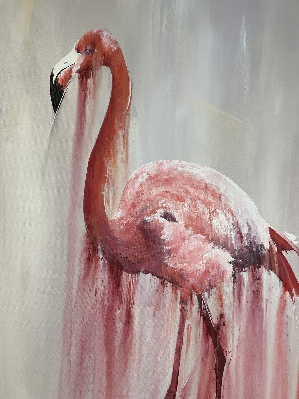 A pink flamingo stands in a dreamy, dripping watercolor style against a soft background.