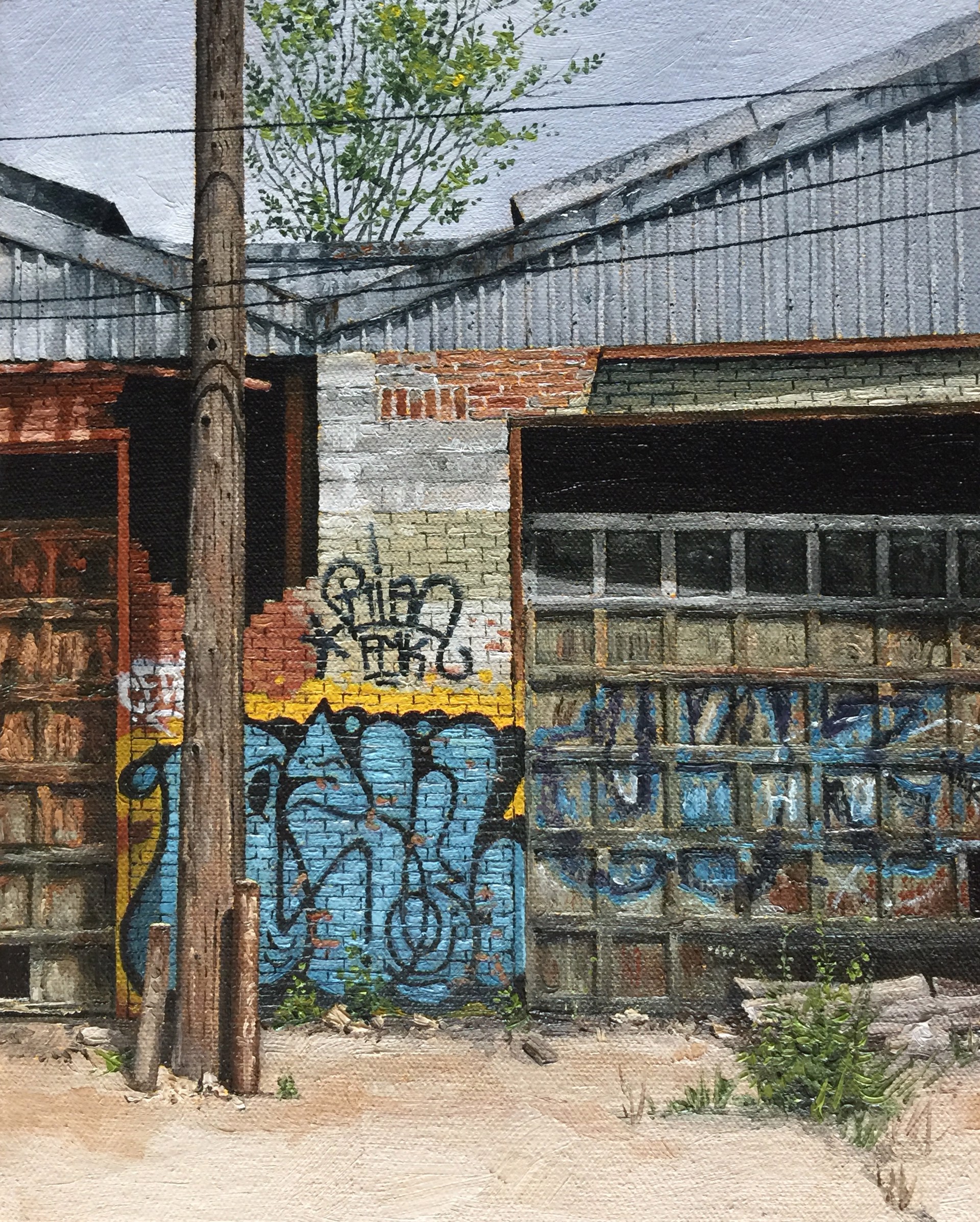 A painting of an old building with graffiti on it.