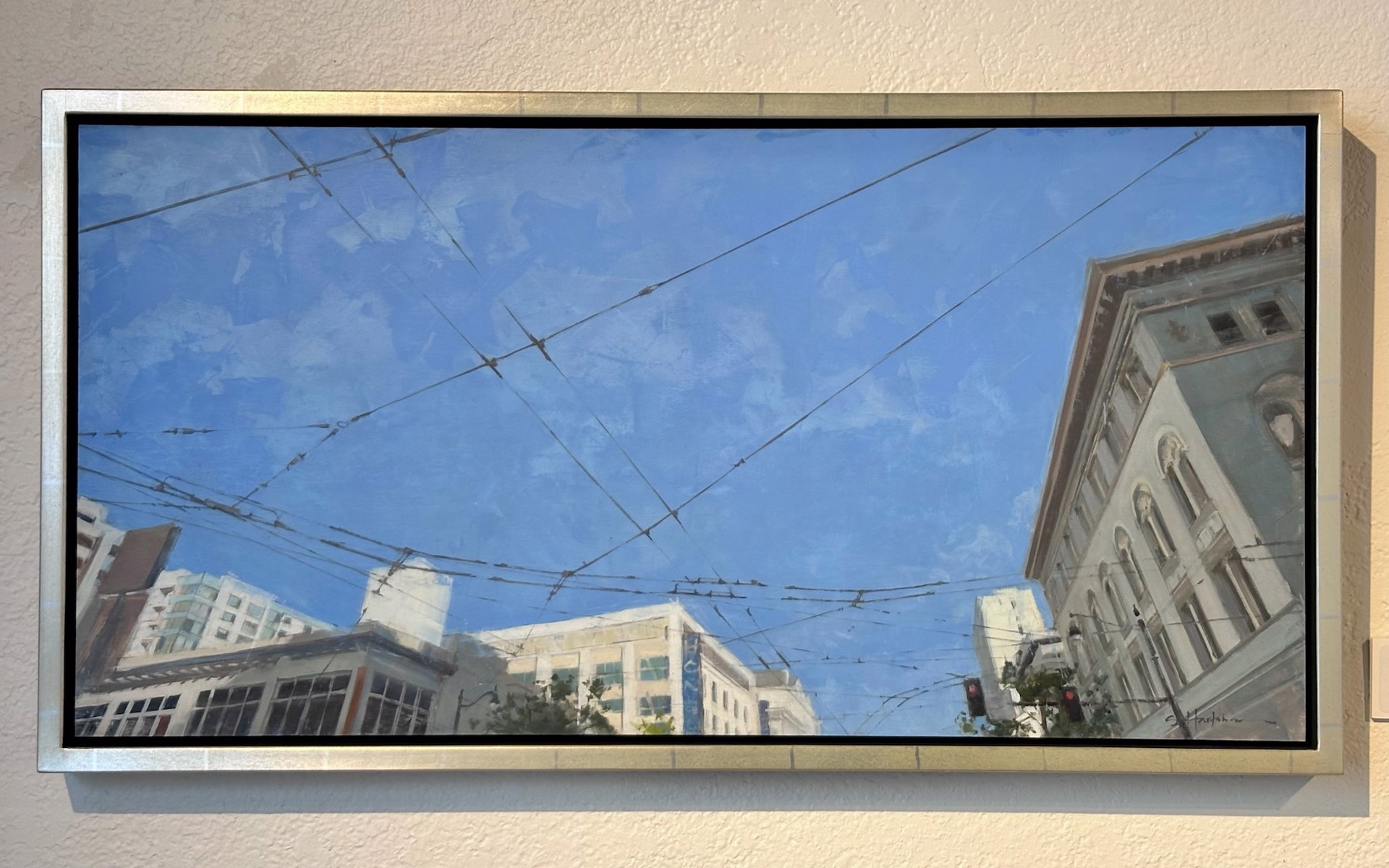 A painting of a city street with power lines in the sky.