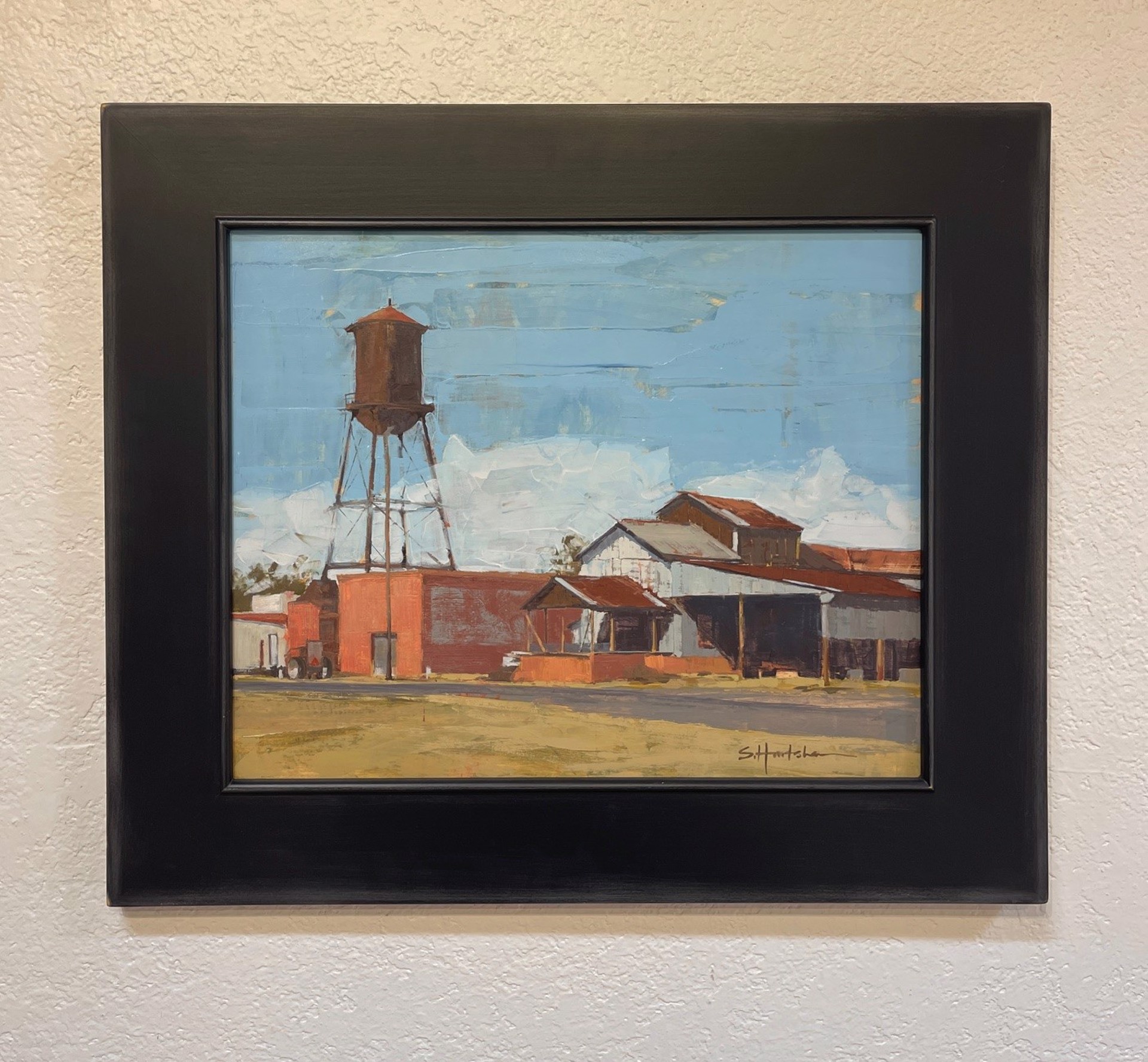 A painting of a water tower in the middle of a field.