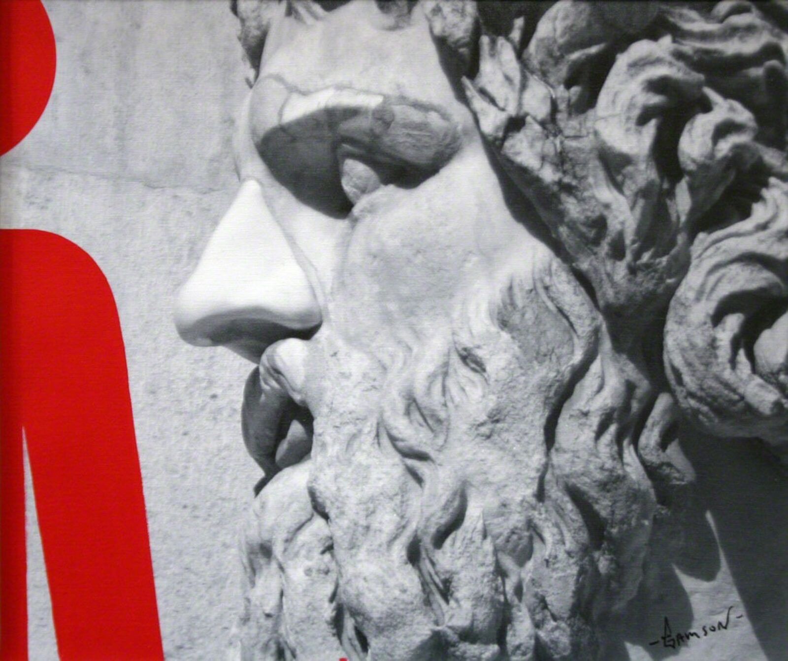 A black and white photo of a statue of a man with a beard.