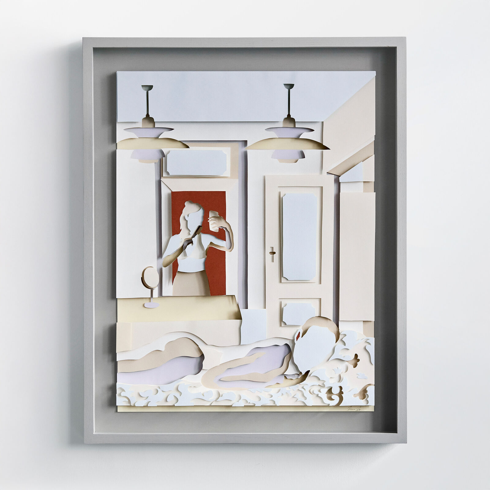 A picture of a woman in a bathroom with a mirror.