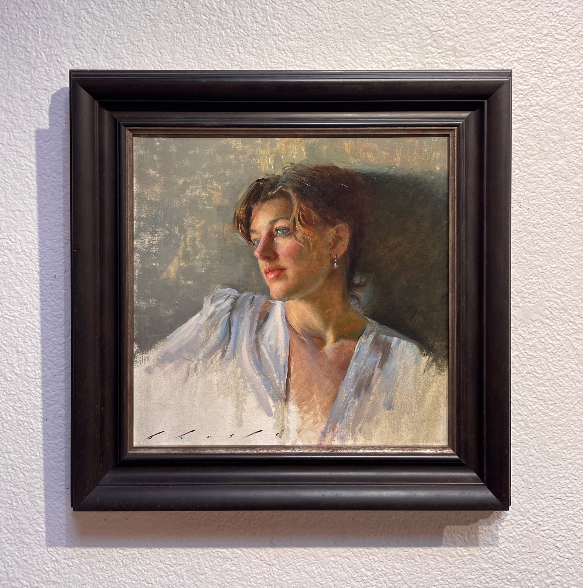 A soft-focus portrait of a person in a white blouse, rendered with loose brushwork and warm lighting.