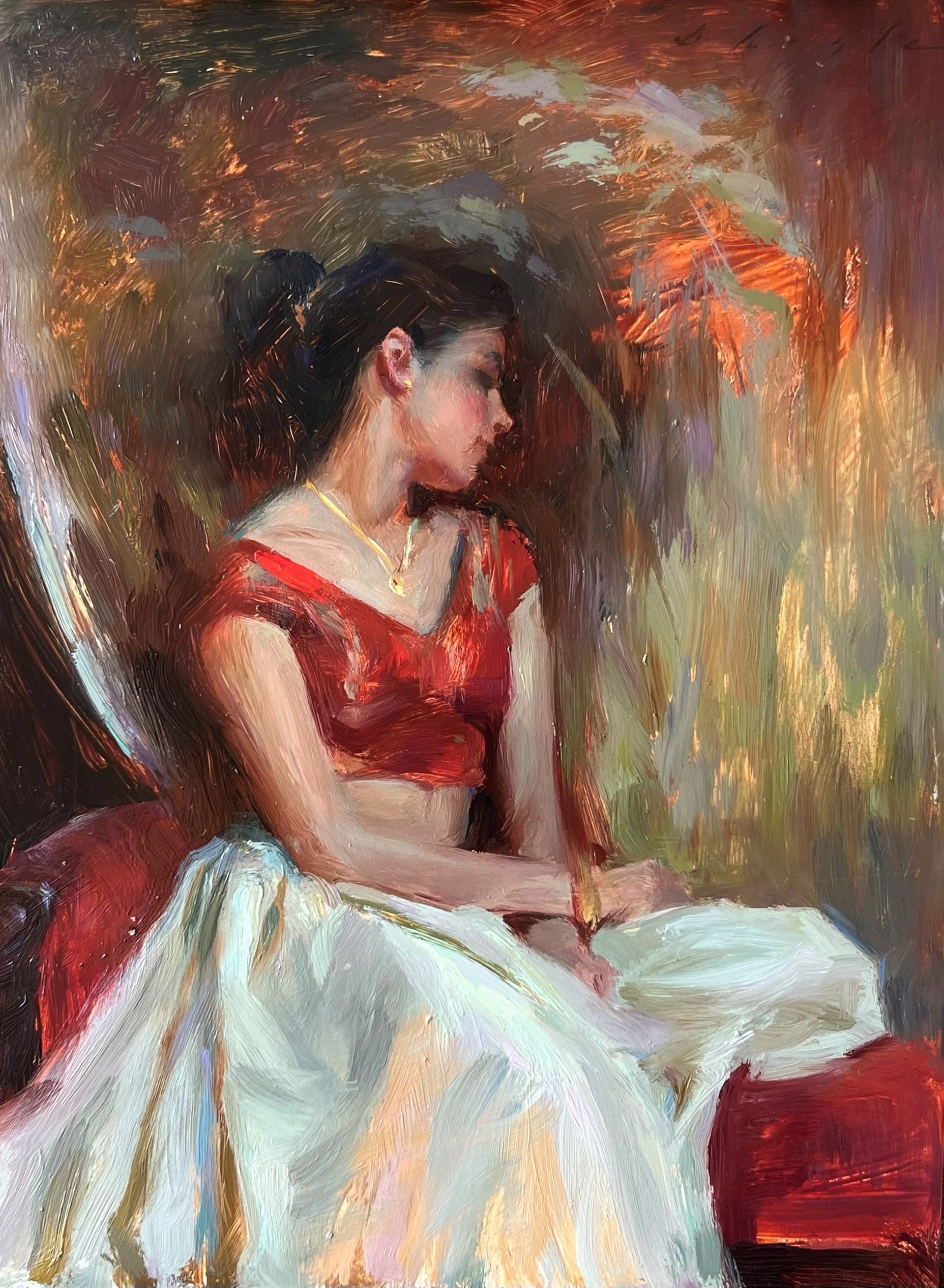 A figure in a red top and white skirt sits in profile against a warm, abstract background.