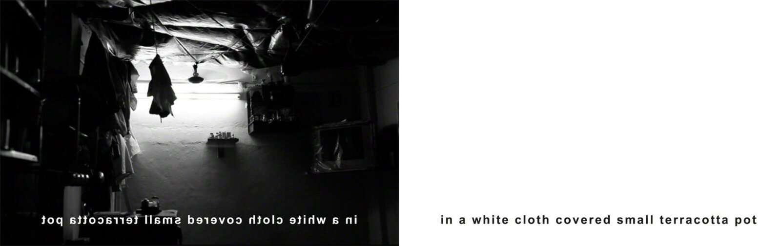 A black-and-white interior shot of a wall adorned with framed portraits and religious art, illuminated by a bright overhead light.