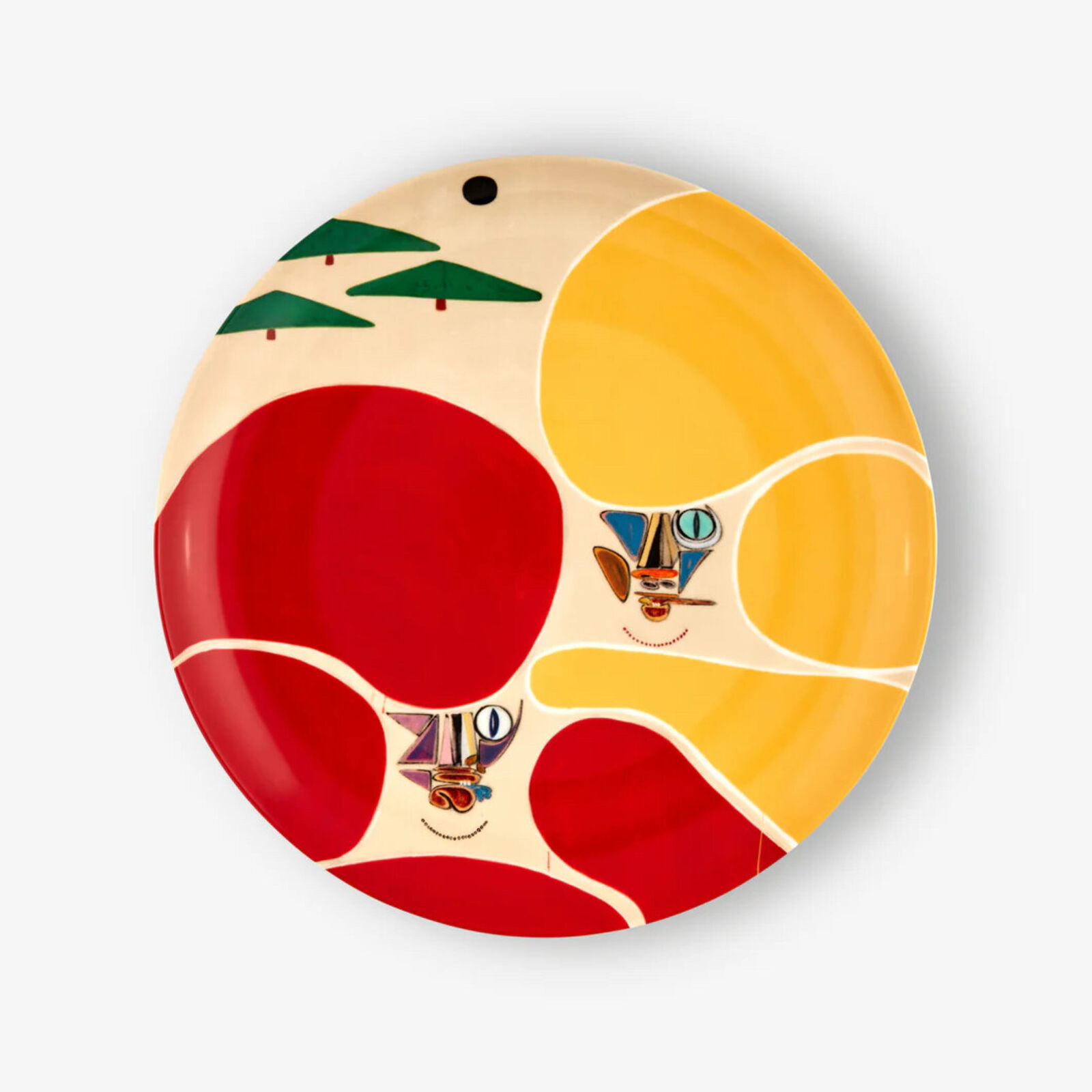 A red and yellow plate with a cat face on it.