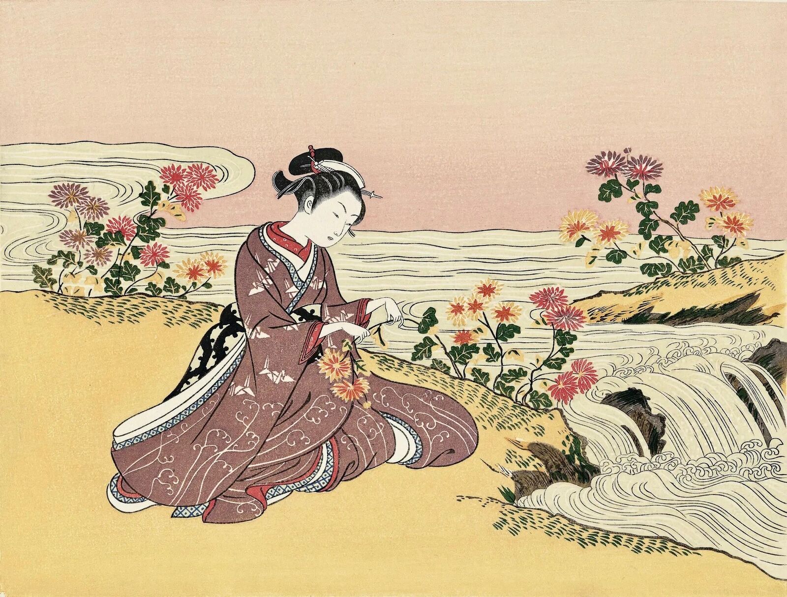 A woman in a kimono sitting on the ground next to a waterfall.