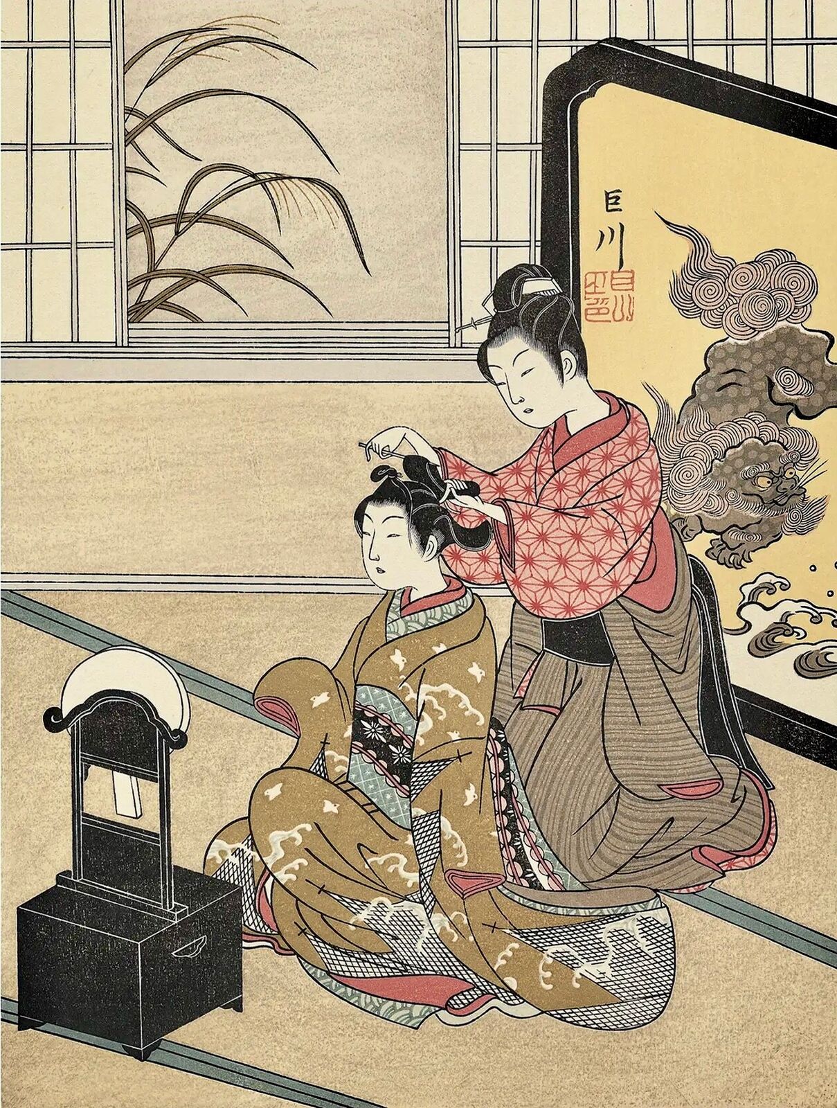 A woman in a kimono is getting her hair done by another woman.