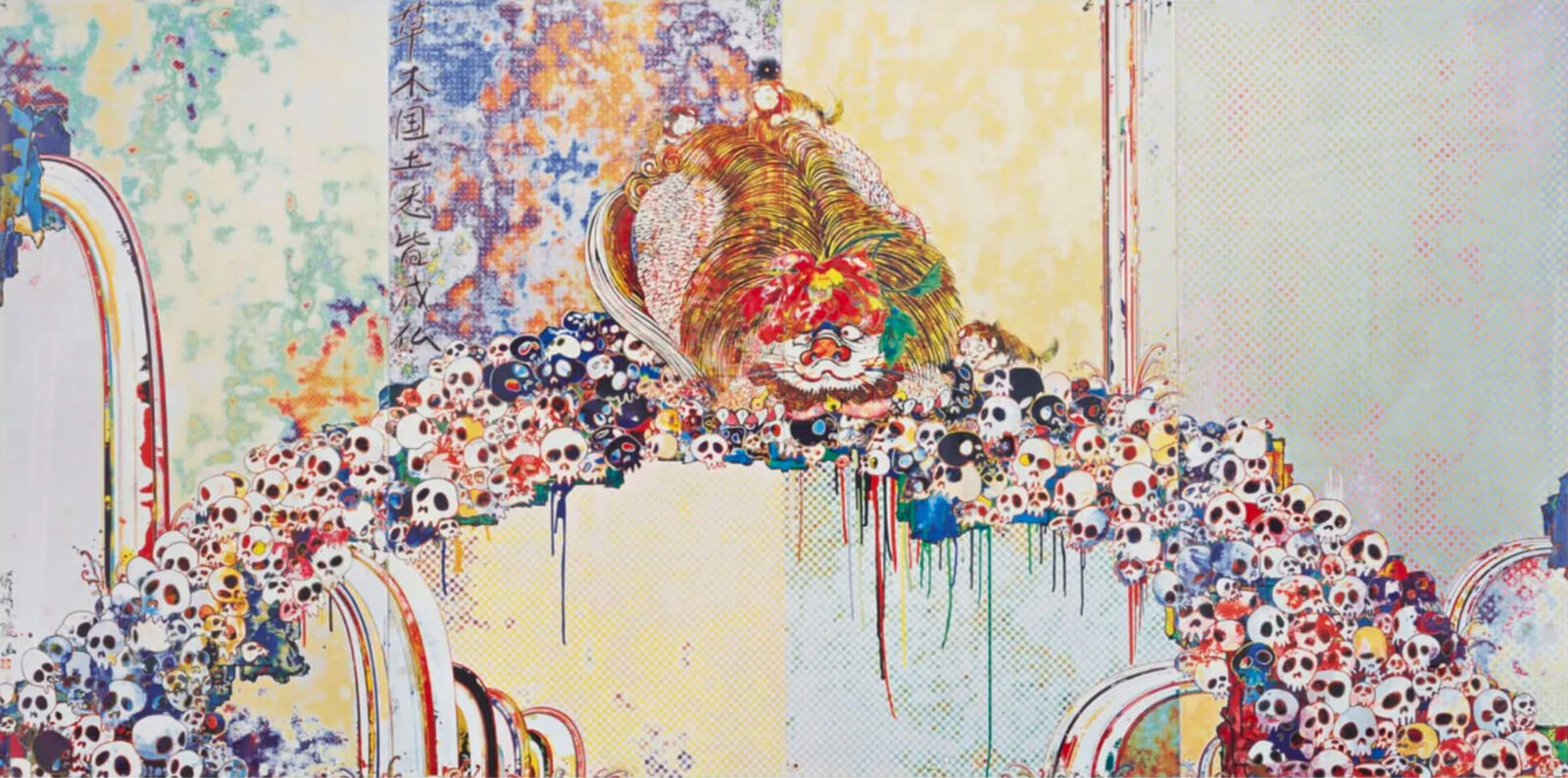 A painting of a lion surrounded by skulls on a wall.