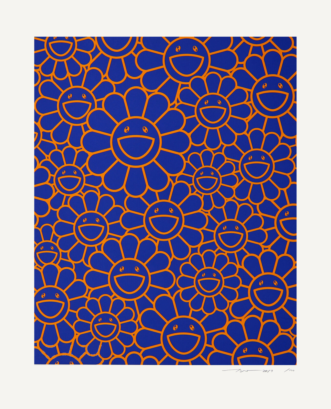 A blue and orange flower pattern with smiley faces.