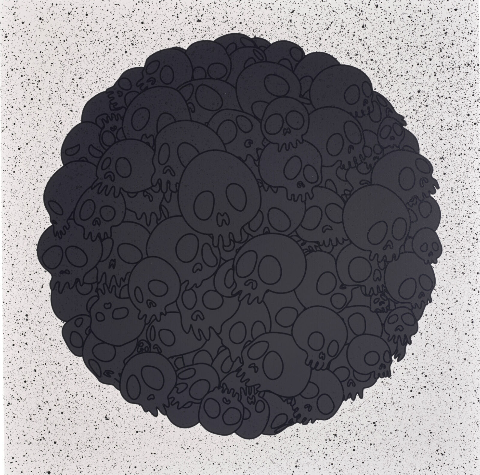 A circle of skulls on a concrete surface.