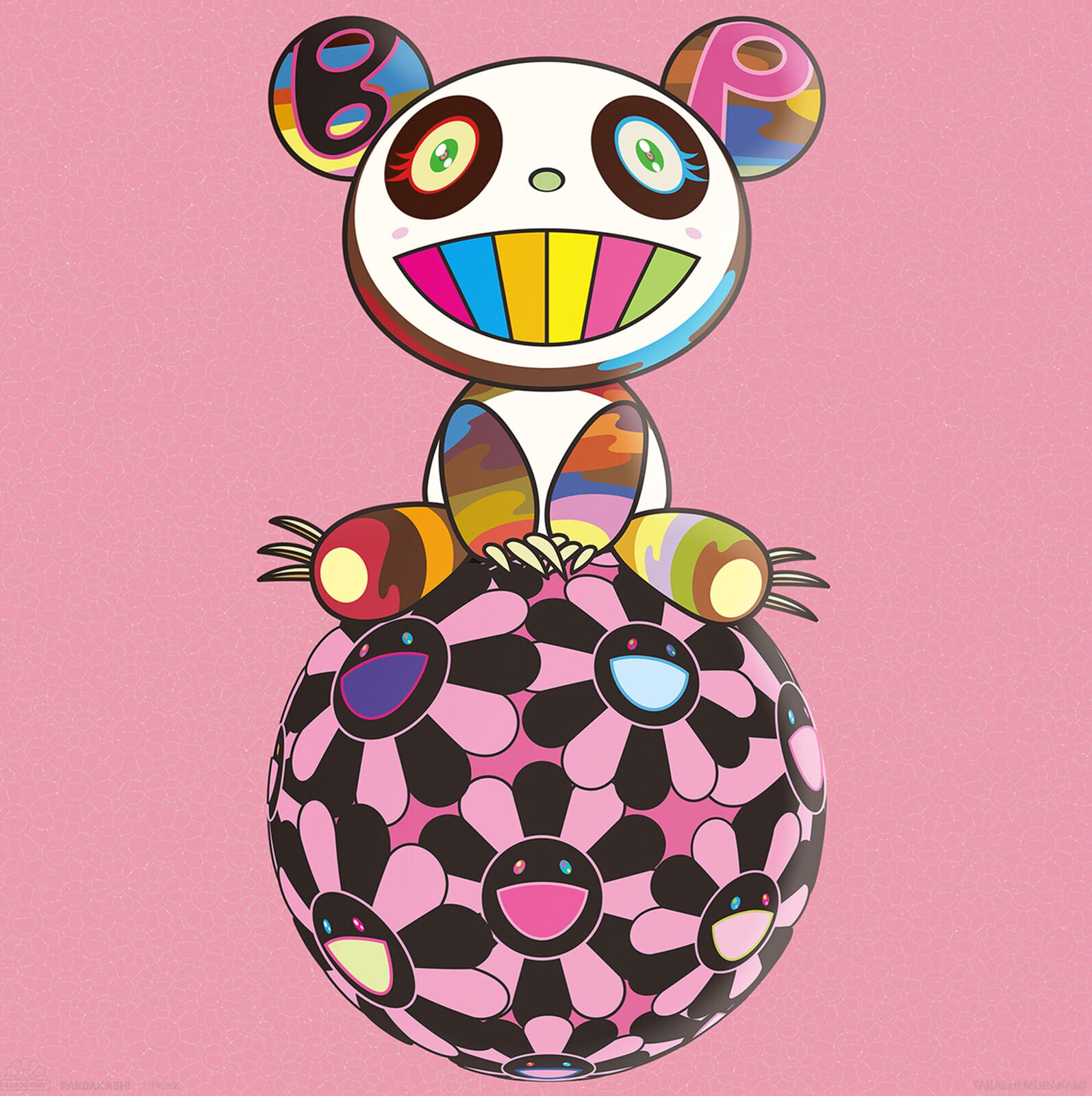 A panda bear sitting on top of a pink ball.