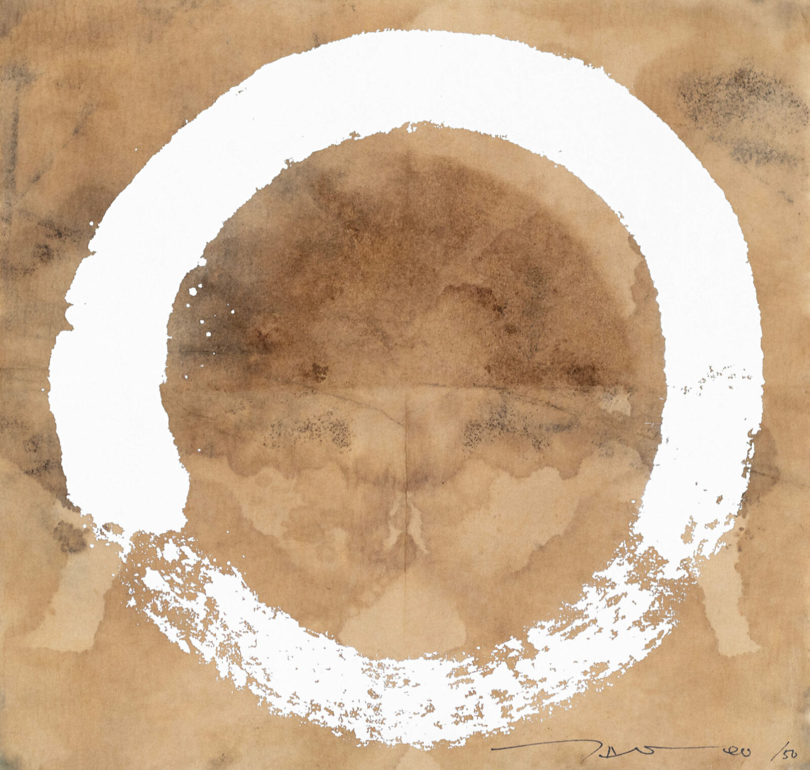 A watercolor painting of a circle on a piece of paper.