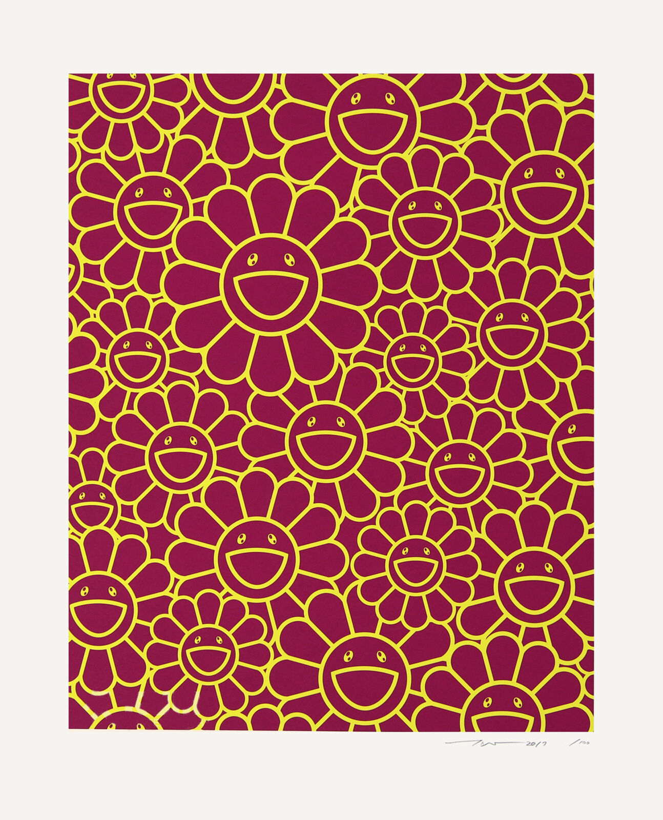 A red and yellow flower pattern with smiley faces on it.