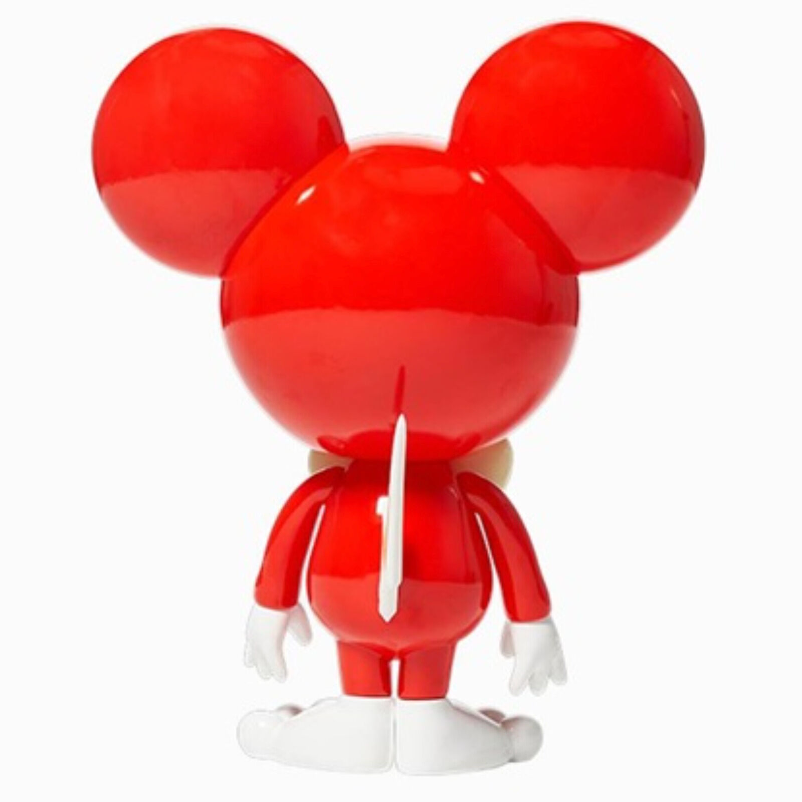 A red and white toy with a bow tie on it's head.