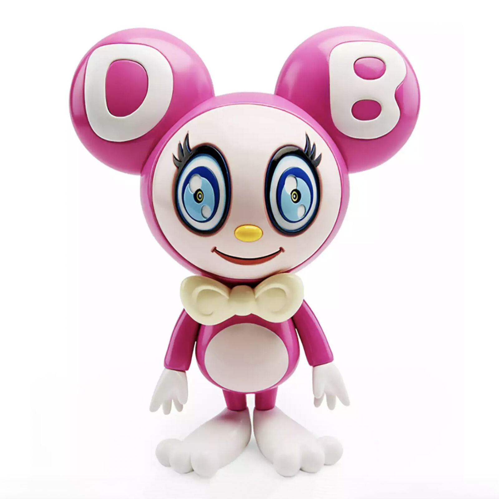 A pink and white toy with a bow tie on it's head.