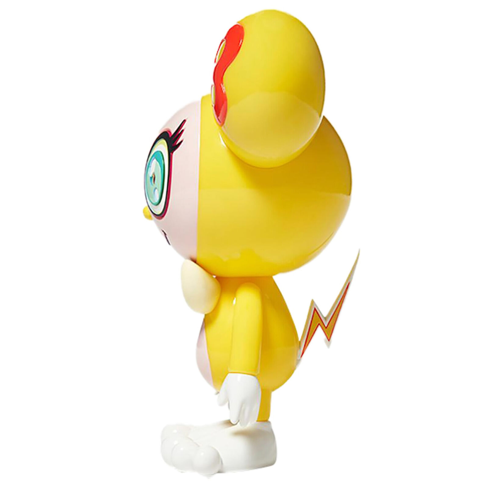 A yellow and white toy with a bow tie on it's head.