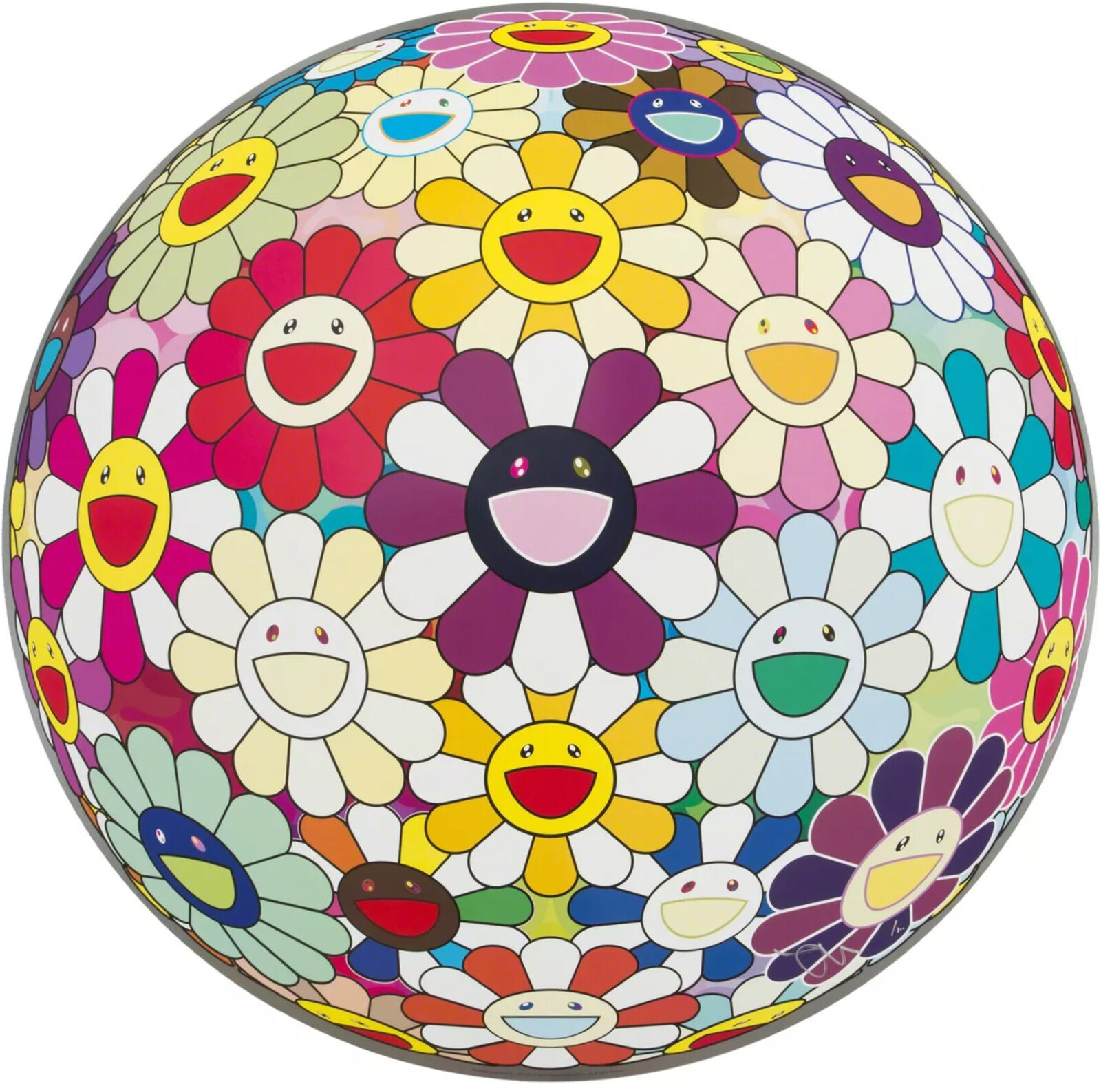 A colorful flower ball with smiley faces on it.
