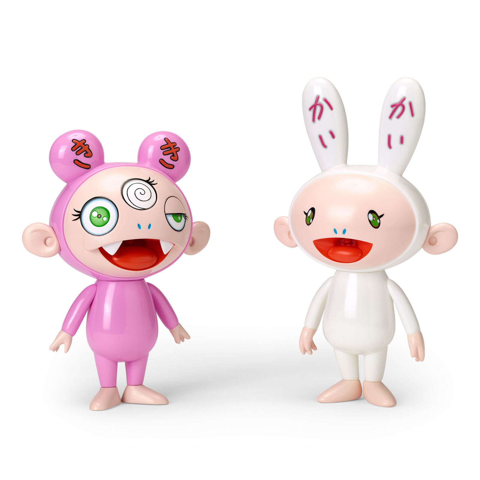 A couple of dolls that are standing next to each other.