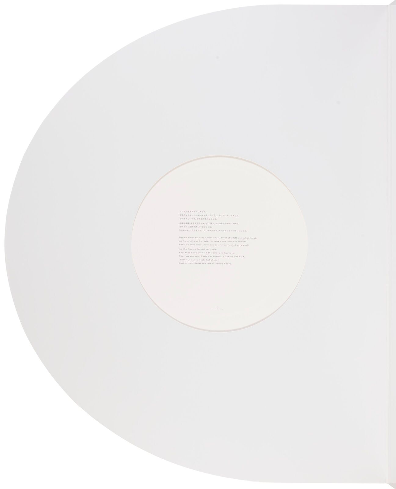 A white pop up book with three pictures inside of it.