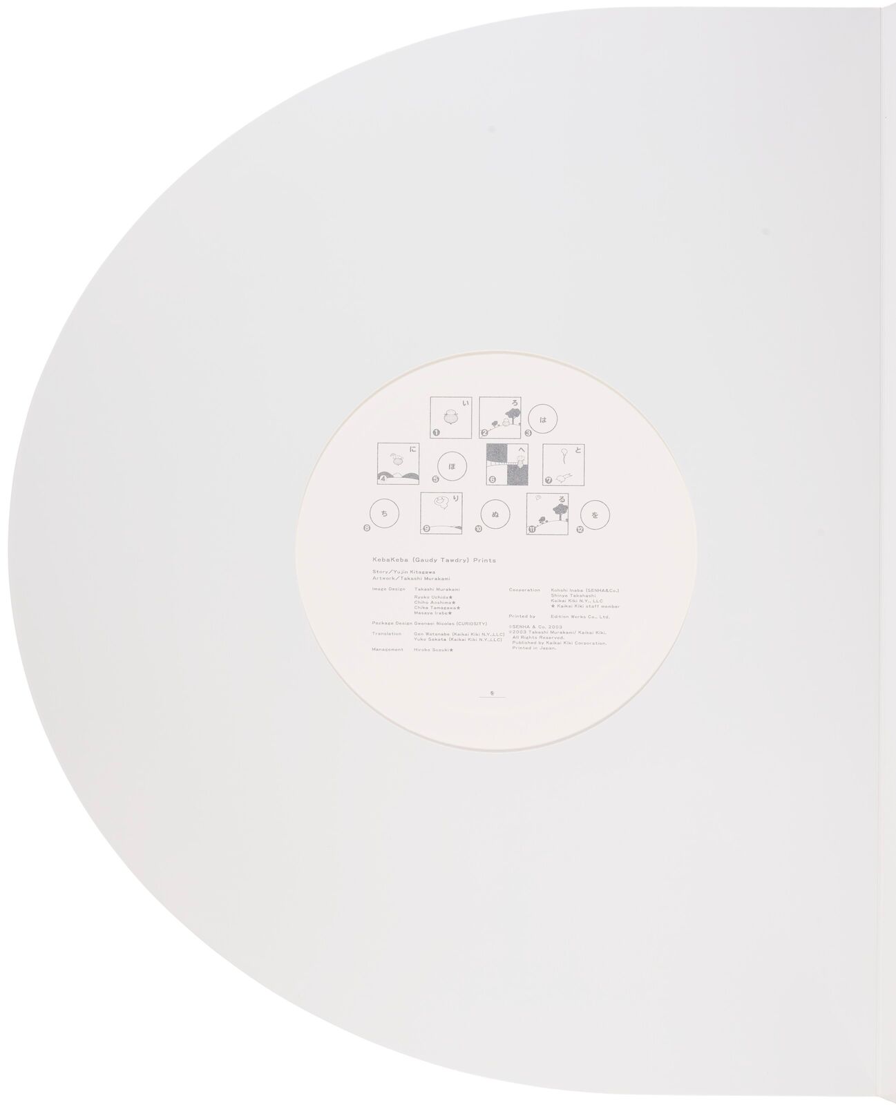 A white pop up book with three pictures inside of it.