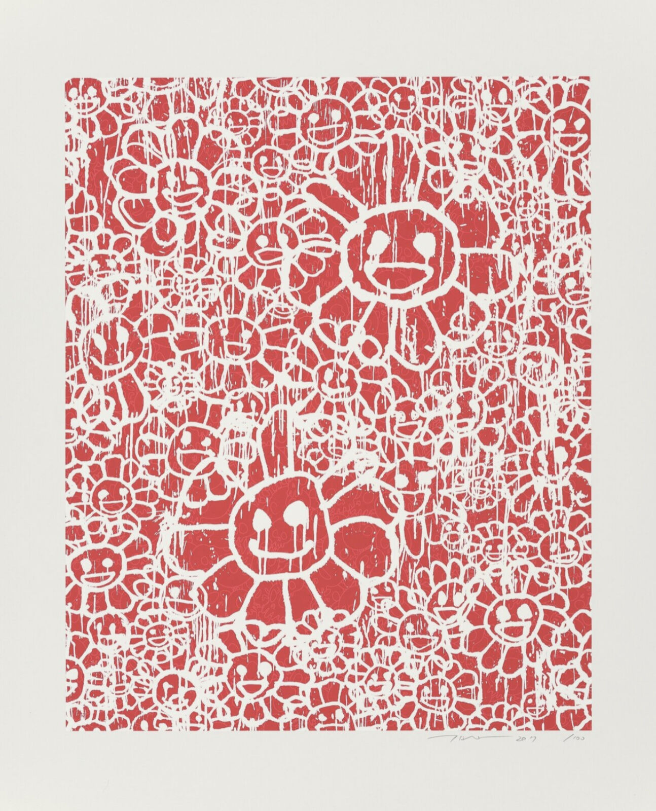 A red and white print with a smiley face on it.