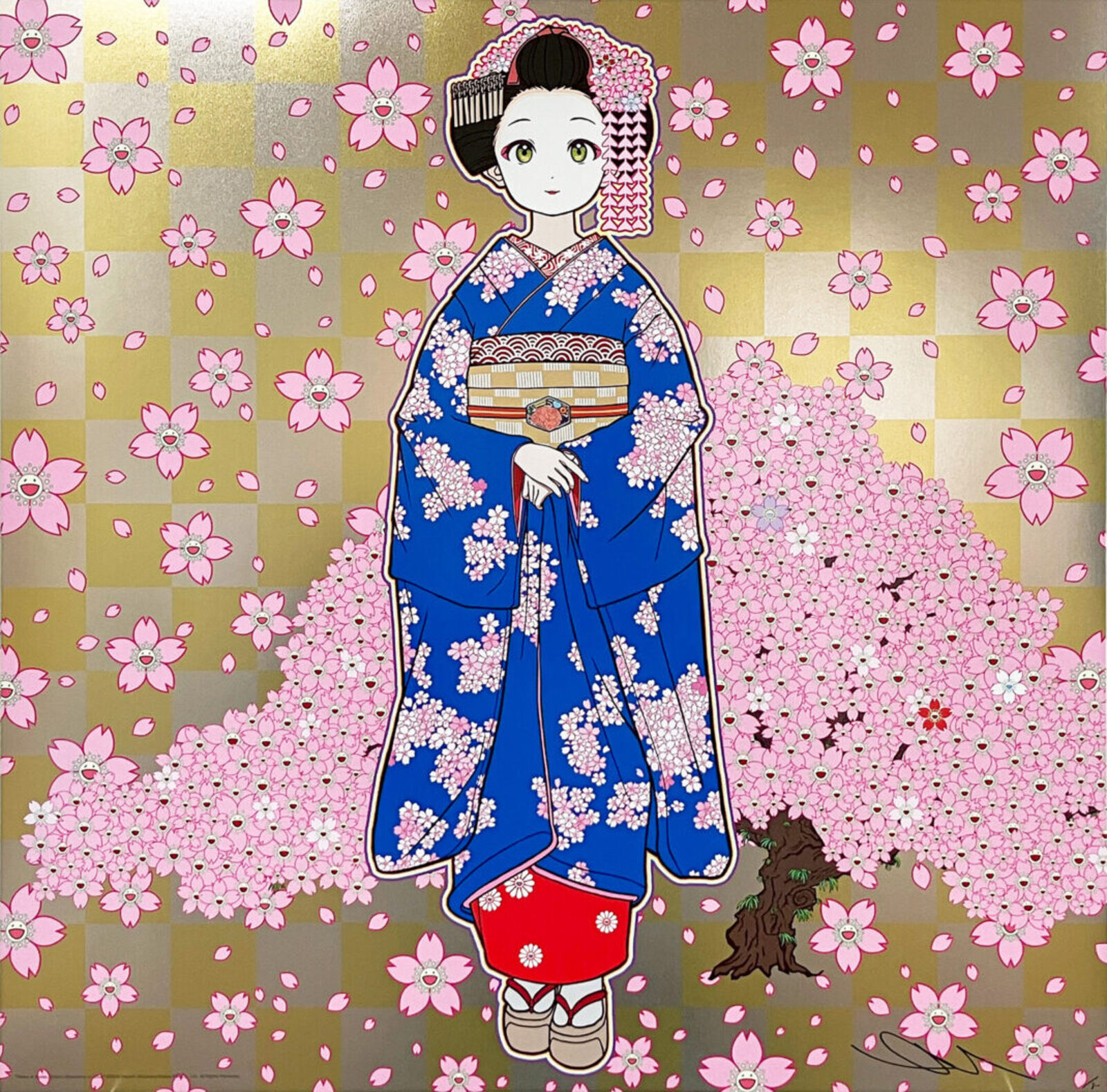 A woman in a blue kimono standing in front of a tree with pink flowers.