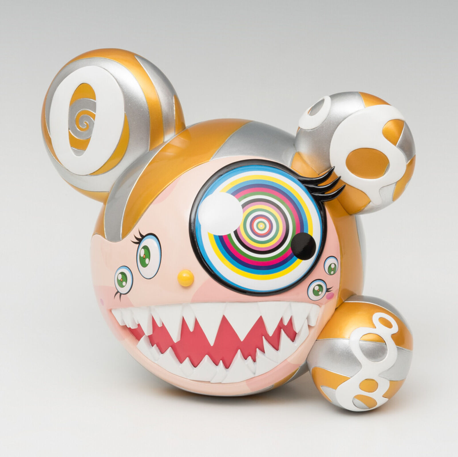 A close up of a toy with a big smile on its face.