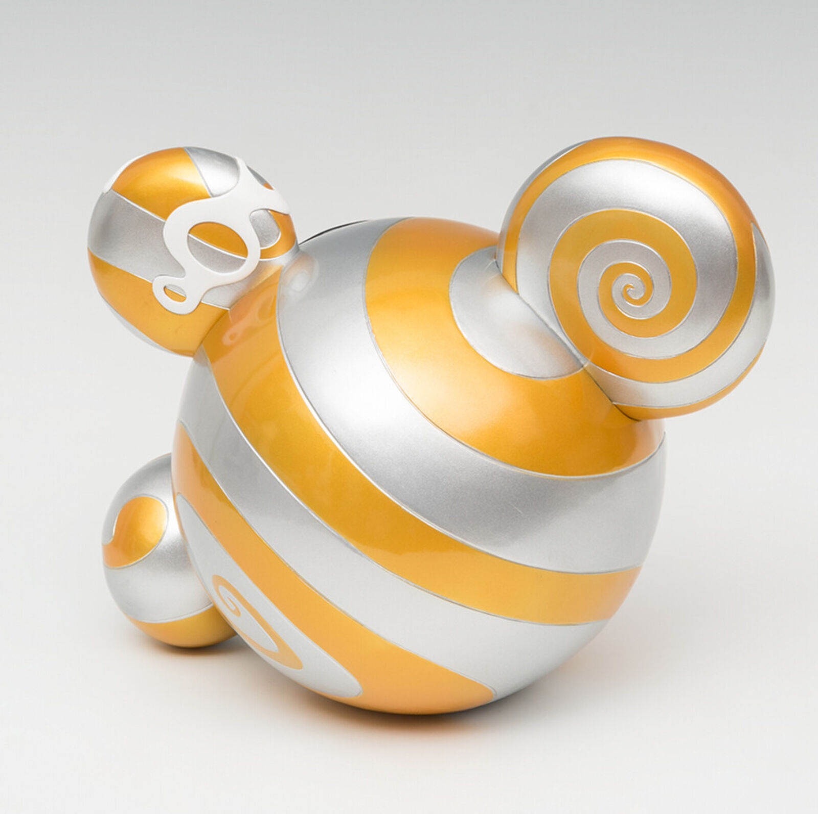 A close up of a toy with a big smile on its face.