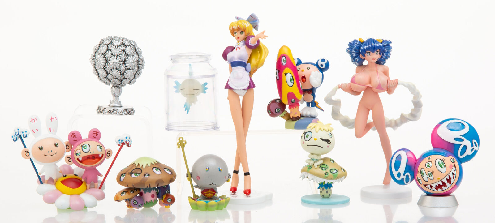 A group of figurines that are sitting on a table.