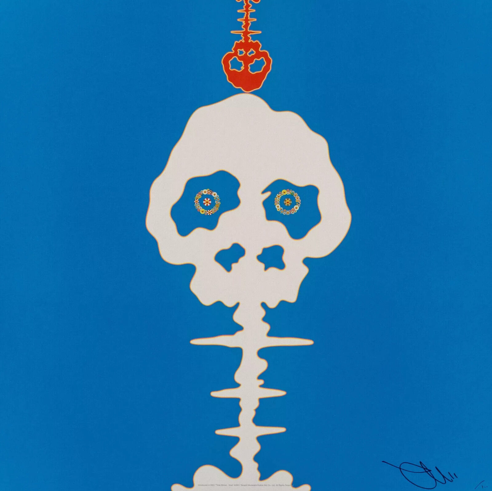 A white skull with a red crown on top of it.