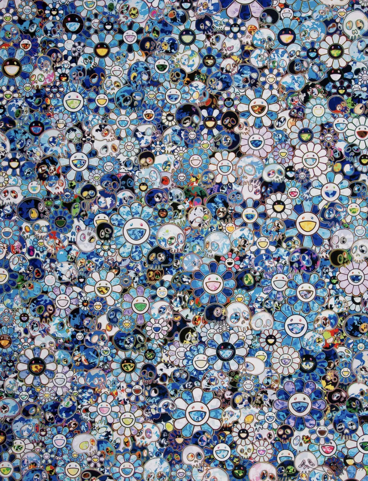 A large group of blue and white flowers on a wall.