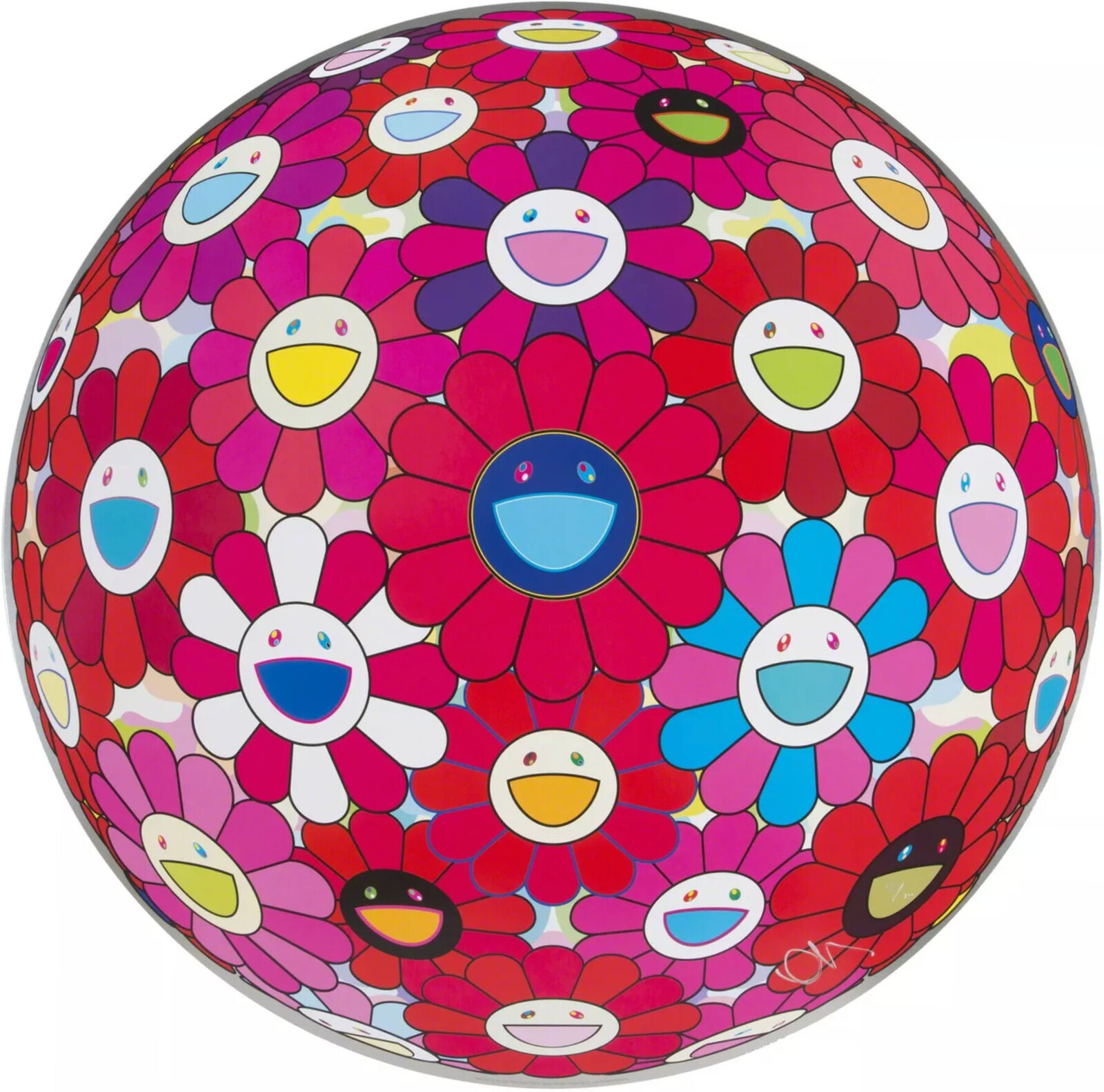 A colorful flower ball with smiley faces on it. 