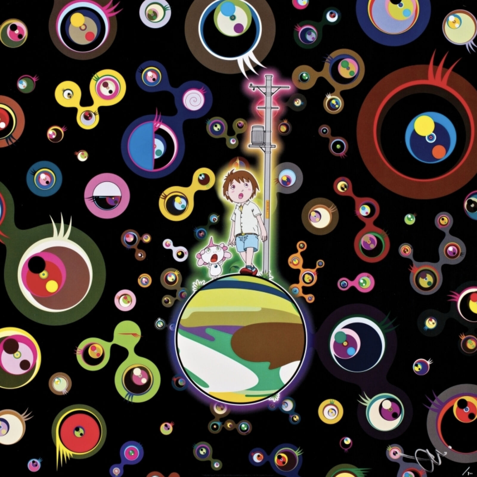 A boy standing on top of a globe surrounded by colorful circles.