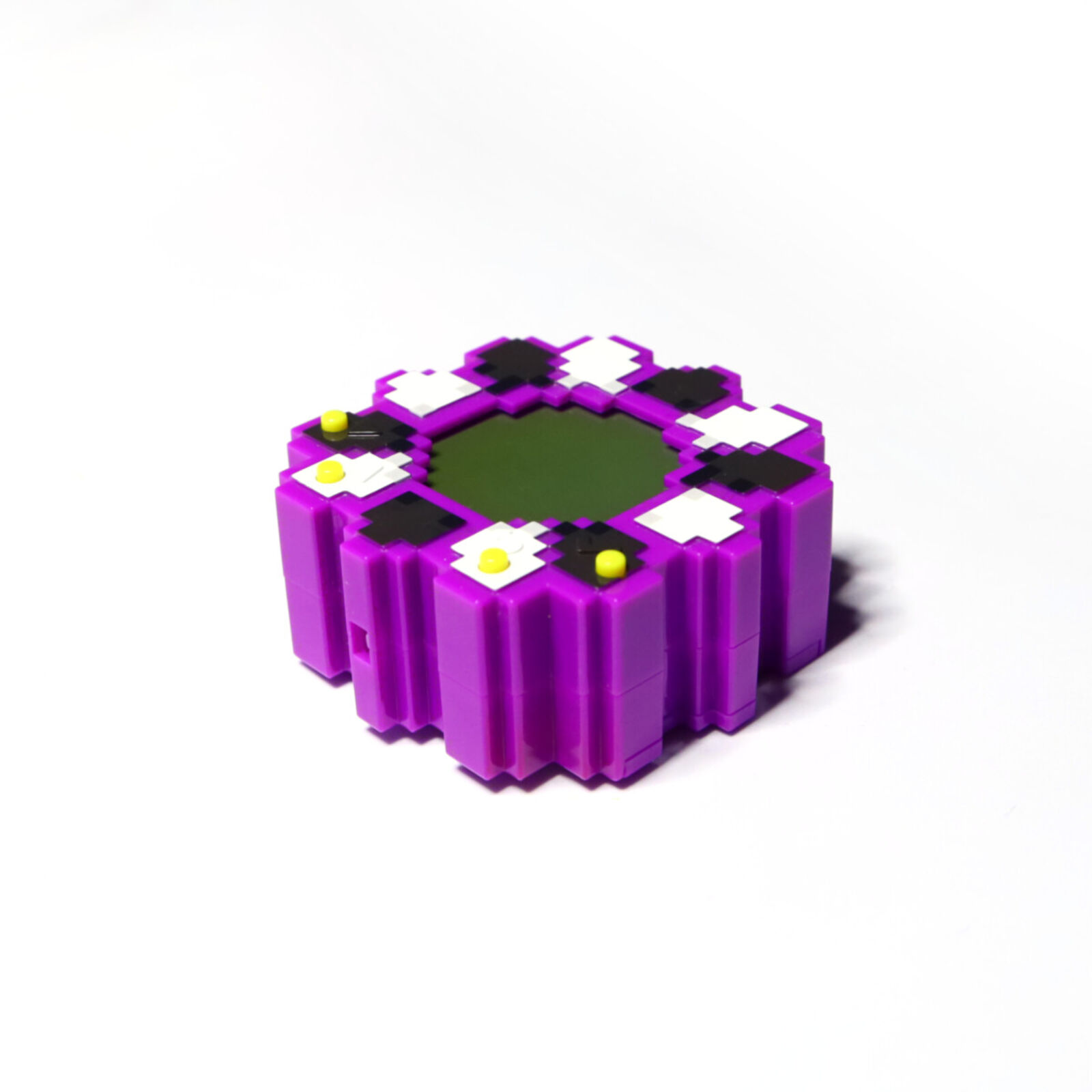 A purple and black flower go milk toy in a package.