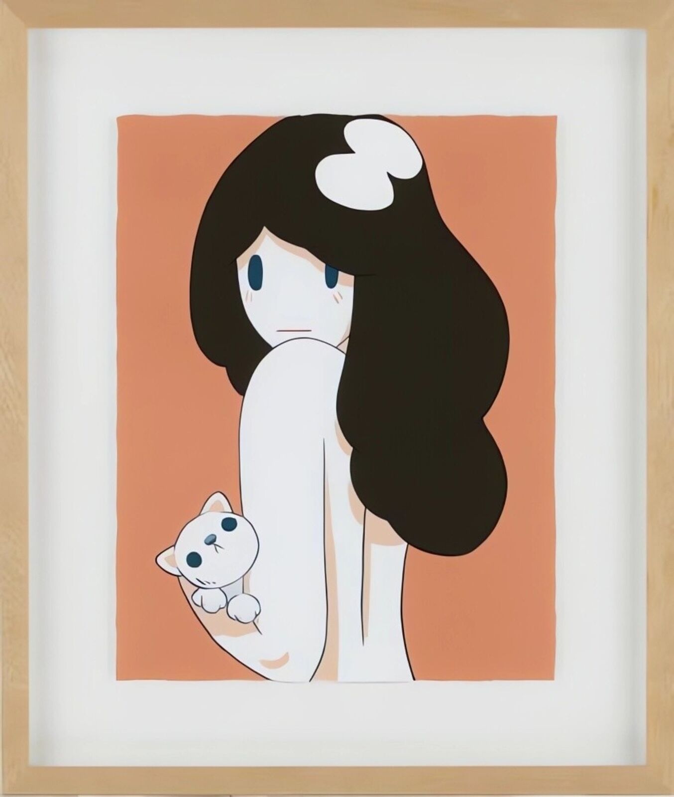 A picture of a girl holding a white cat.