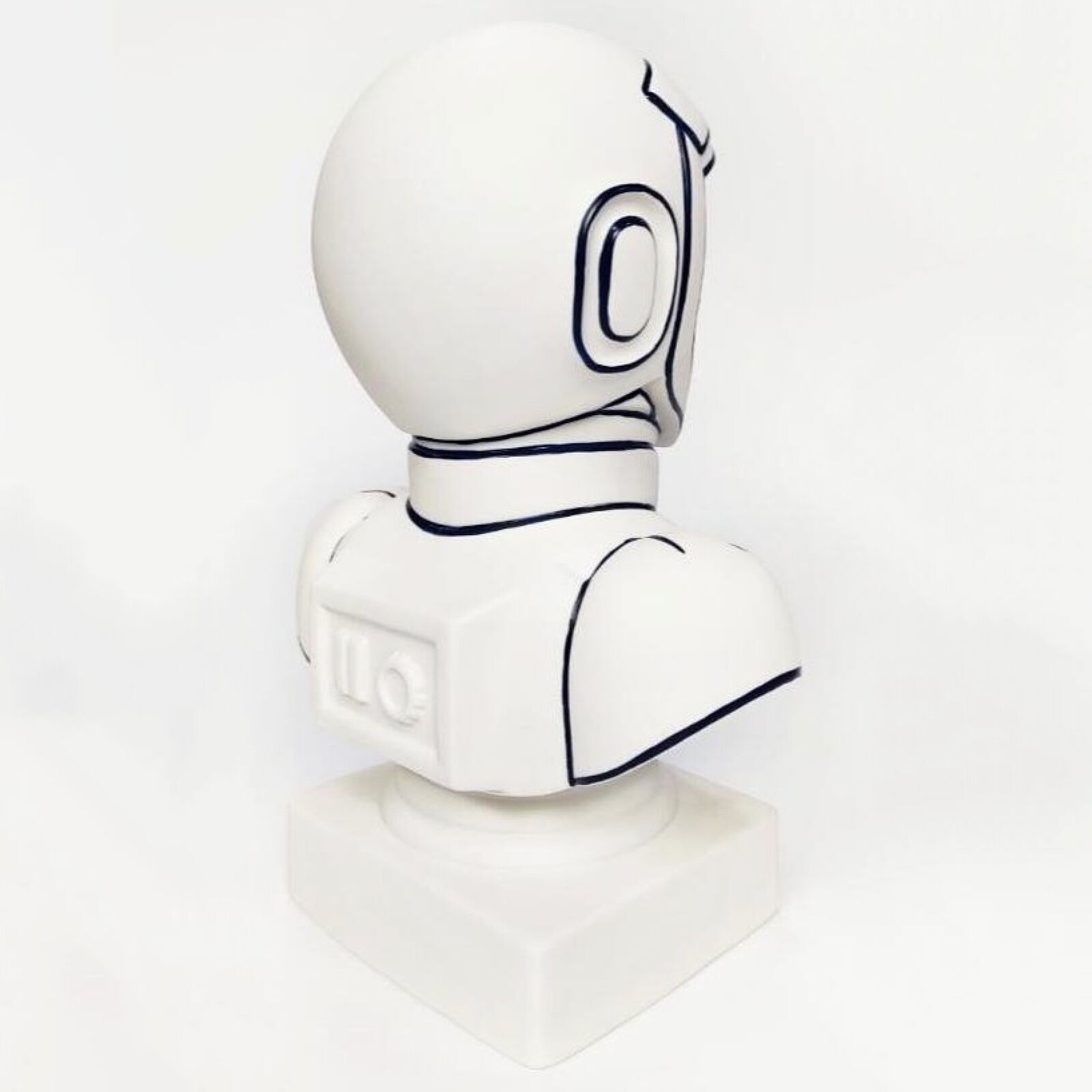 A white bust of a man in a space suit with a red light on his head.