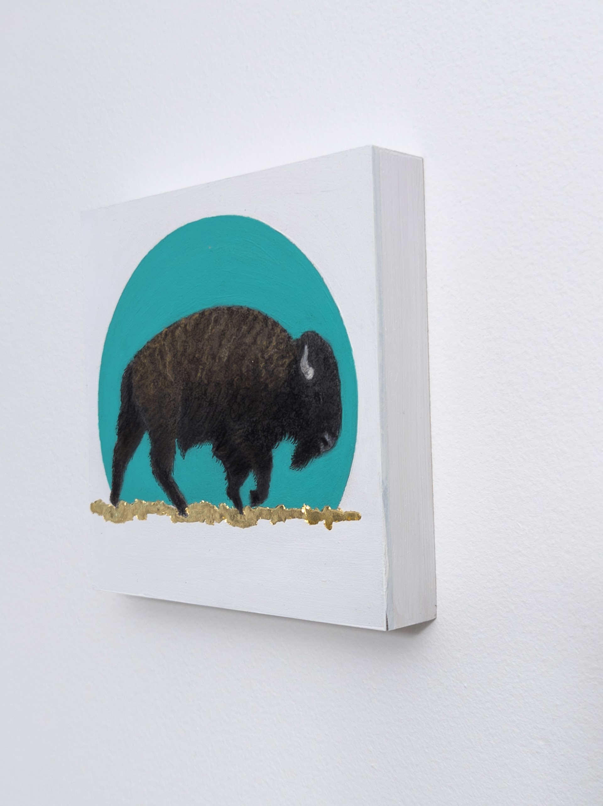 A painting of a bison walking across a field.