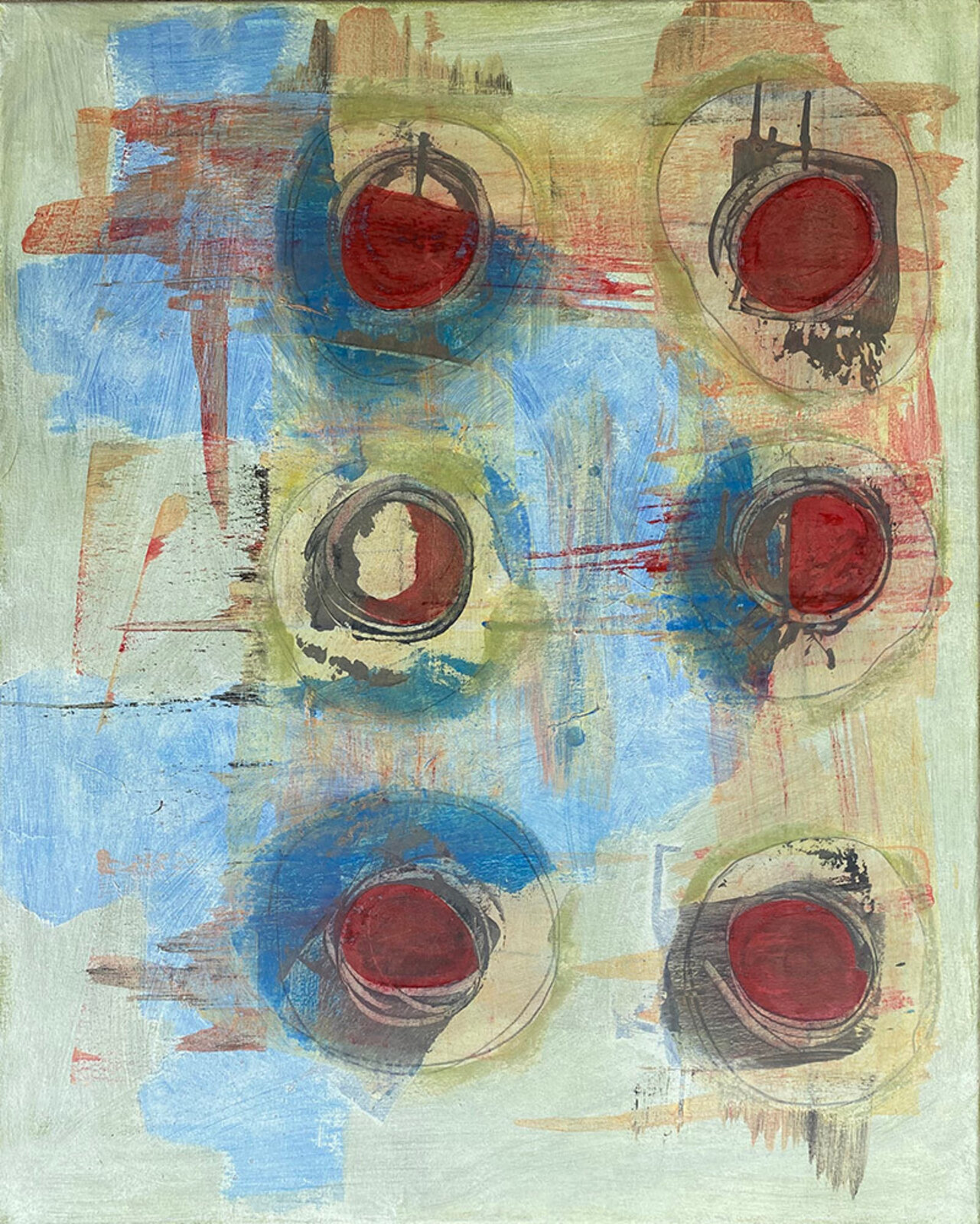 A painting with red and blue circles on a green background.