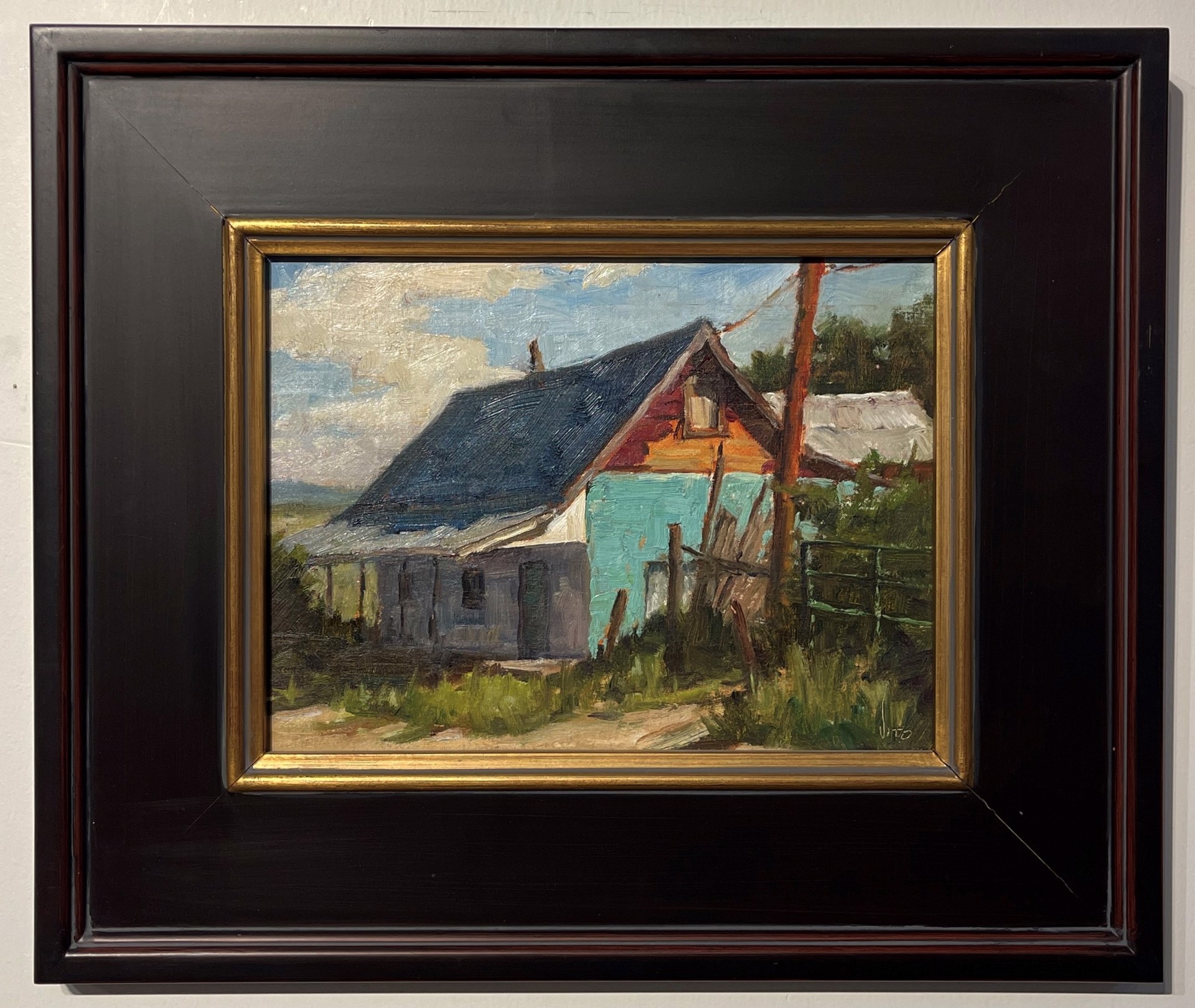 A painting of an old barn with a blue roof.