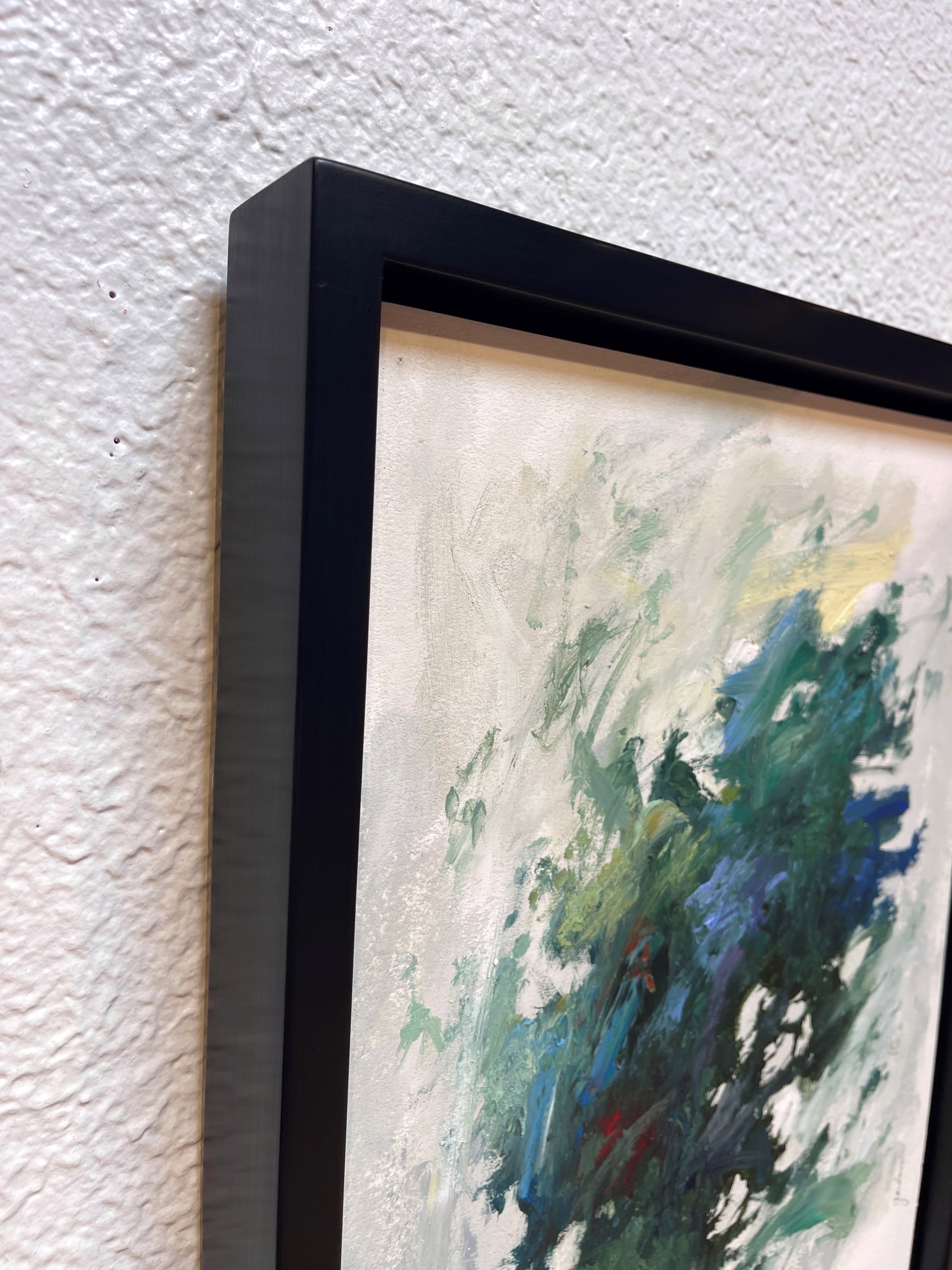 A painting of a blue and green abstract painting on a white background.