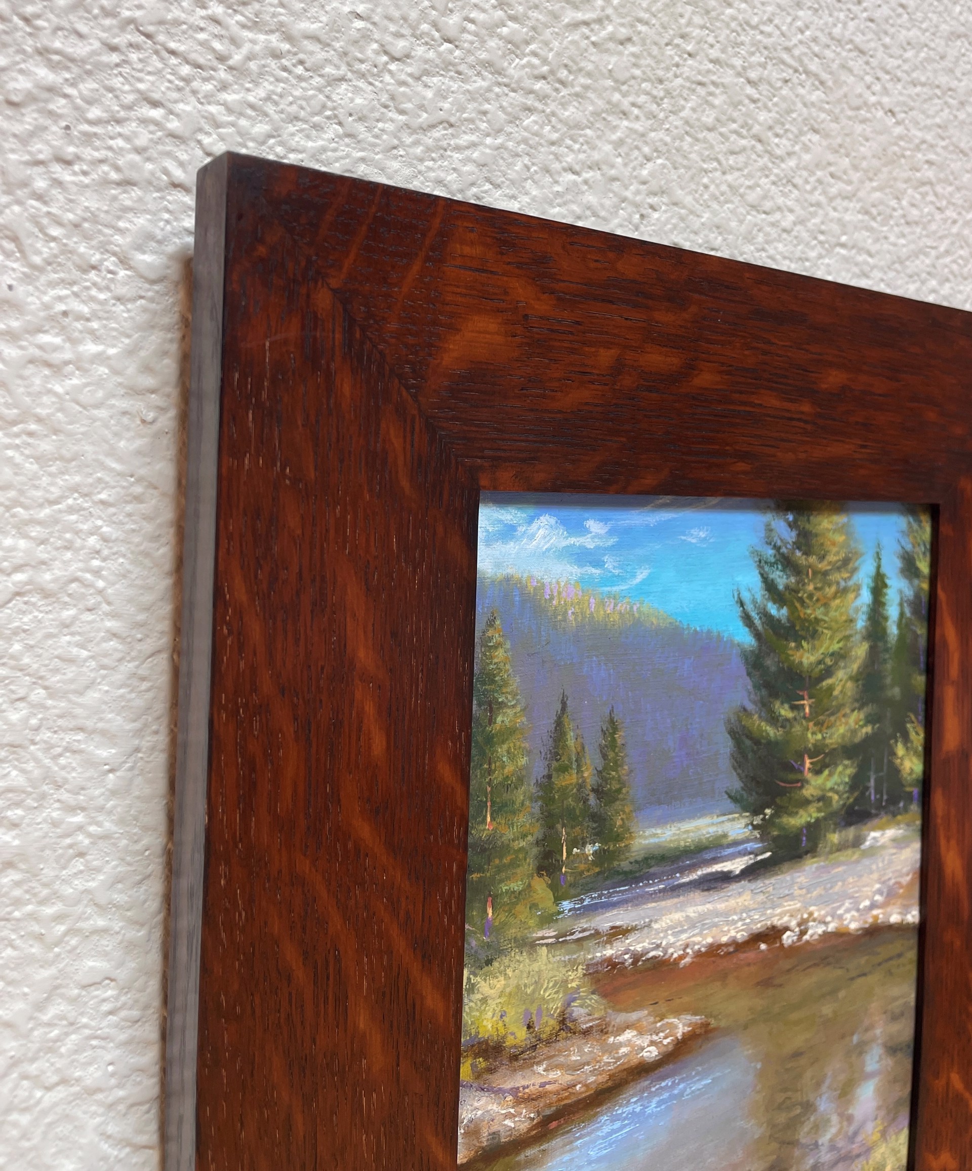 A painting of a river in the middle of a forest.
