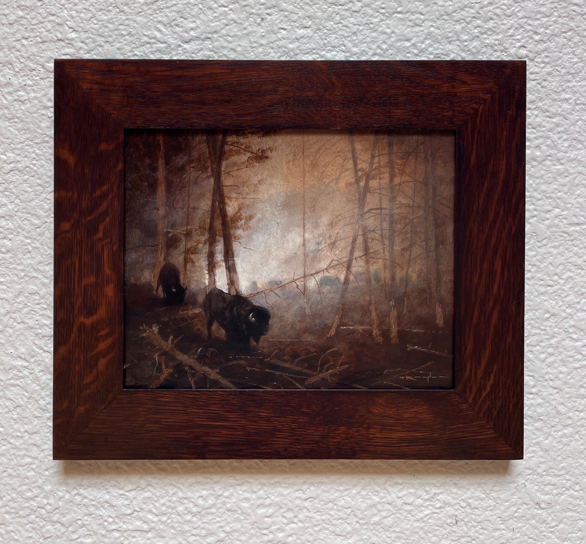 A painting of two bison in a wooded area in the woods.