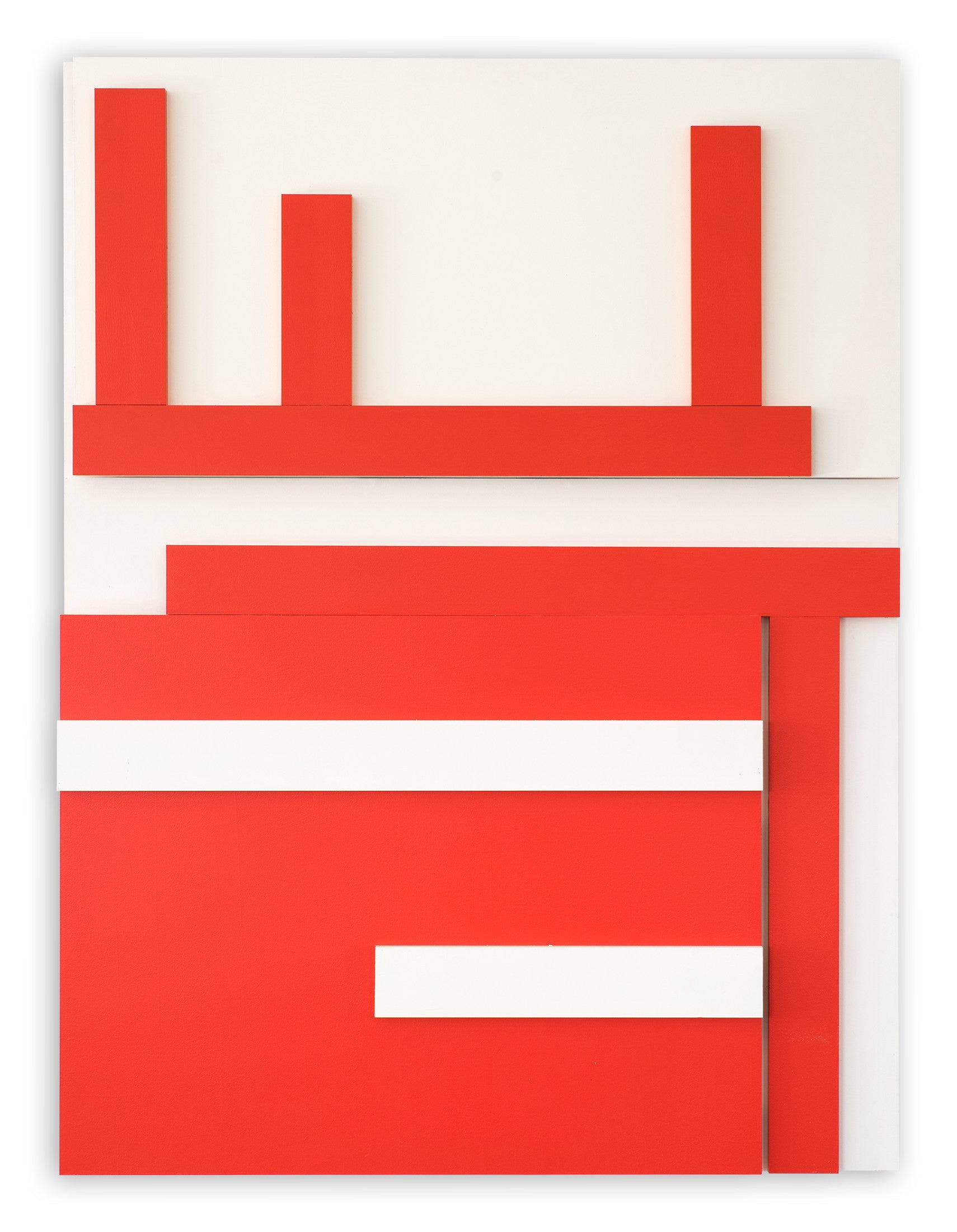 A red and white wall hanging on a white wall.