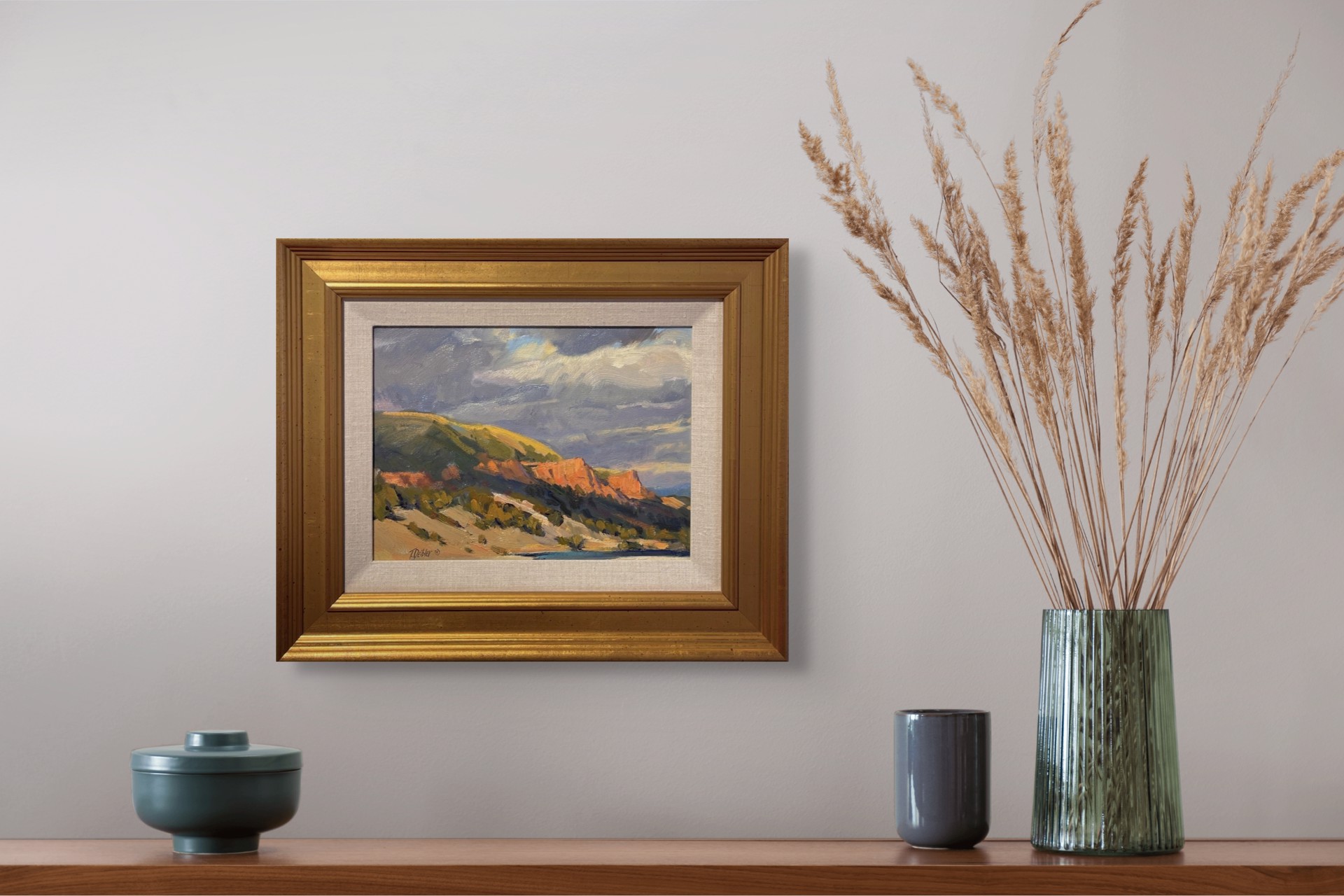 A painting of a landscape with mountains in the background.