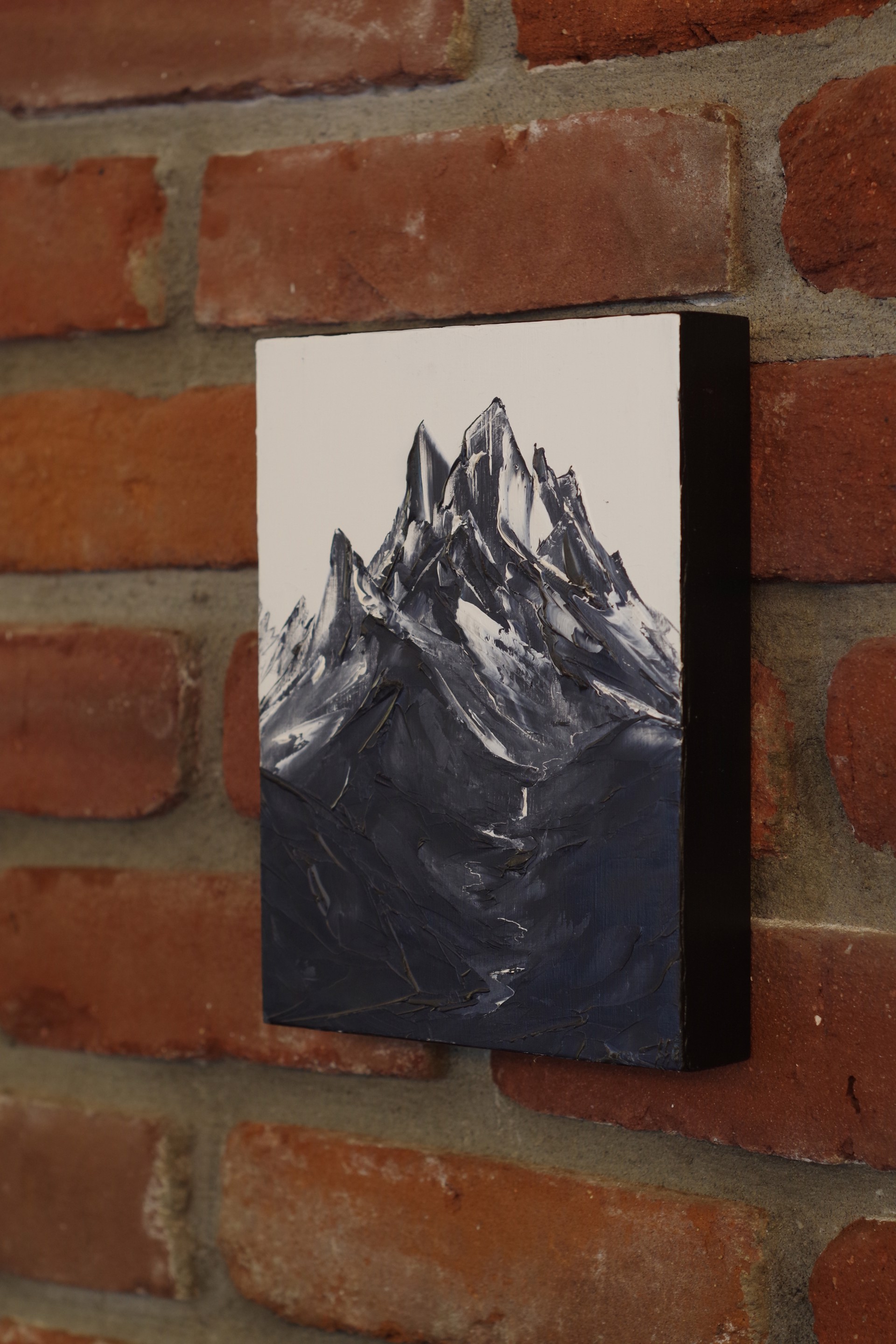 A black and white photo of a mountain.