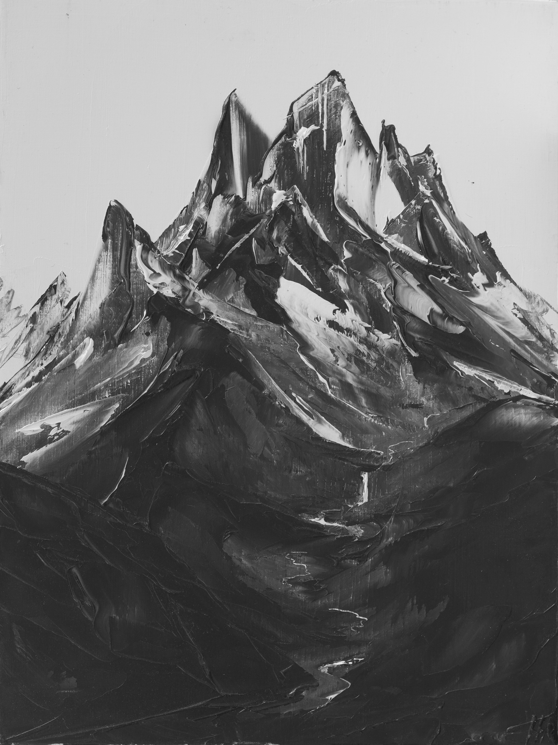 A black and white photo of a mountain.