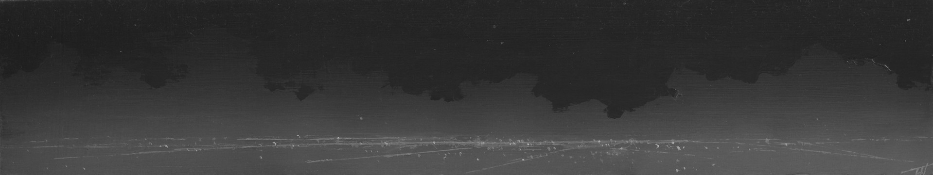 A black and white photo of a city at night.
